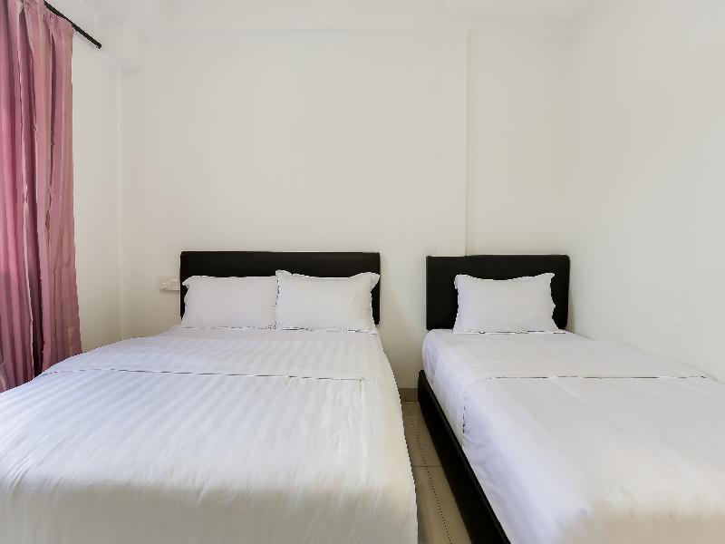 Super Oyo 89495 Rich Hotel Air Hitam Extérieur photo