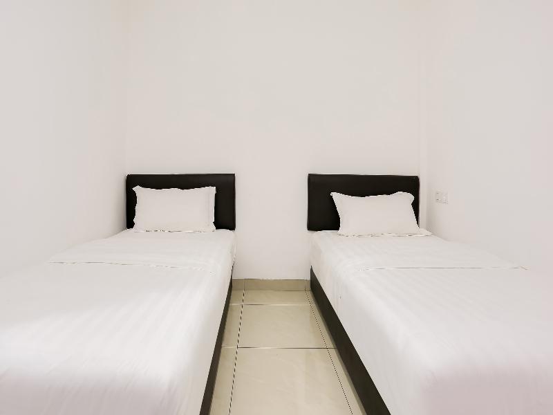 Super Oyo 89495 Rich Hotel Air Hitam Extérieur photo